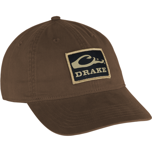 Cotton Twill Patch Cap with a brown logo, low profile, contoured bill, and brass buckle back strap. 