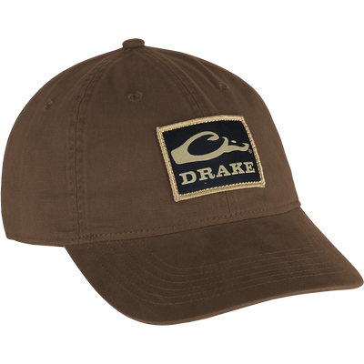 Cotton Twill Patch Cap with a low profile, contoured bill, and brass buckle back strap, embodying casual style suitable for outdoor and hunting enthusiasts.