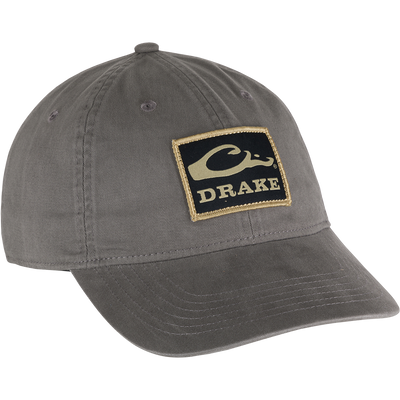 Cotton Twill Patch Cap featuring a grey design with a logo, low profile, contoured bill, and brass buckle back strap for comfort.