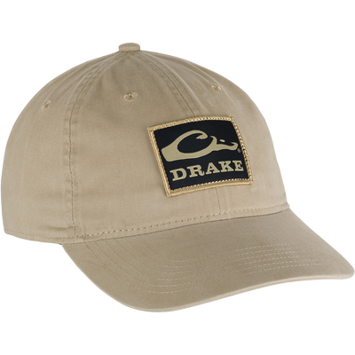 Cotton Twill Patch Cap with a low profile, contoured bill, and brass buckle back strap, made from 100% cotton twill.