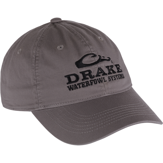 Cotton Twill Systems Cap: A low-profile baseball cap made of 100% cotton twill. Features a contoured bill and brass buckle backstrap for a snug fit. Stay cool and stylish with this high-quality headgear.