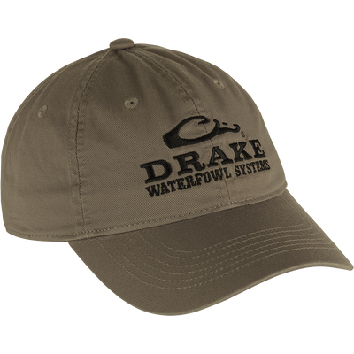 Cotton Twill Systems Cap, a low-profile baseball cap with black text, features a contoured bill and brass buckle backstrap for snug fit.