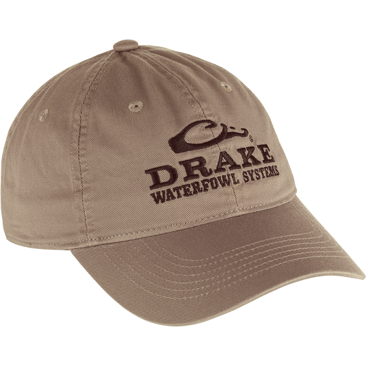 Cotton Twill Systems Cap: A low-profile brown hat with a logo, contoured bill, and brass buckle backstrap. Stay cool and stylish with this 100% cotton twill headgear.