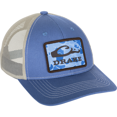 Old School Patch 2.0 Mesh Back Cap: A blue hat with a logo patch and adjustable snap-back closure. 6-panel structured crown construction and pre-curved visor.