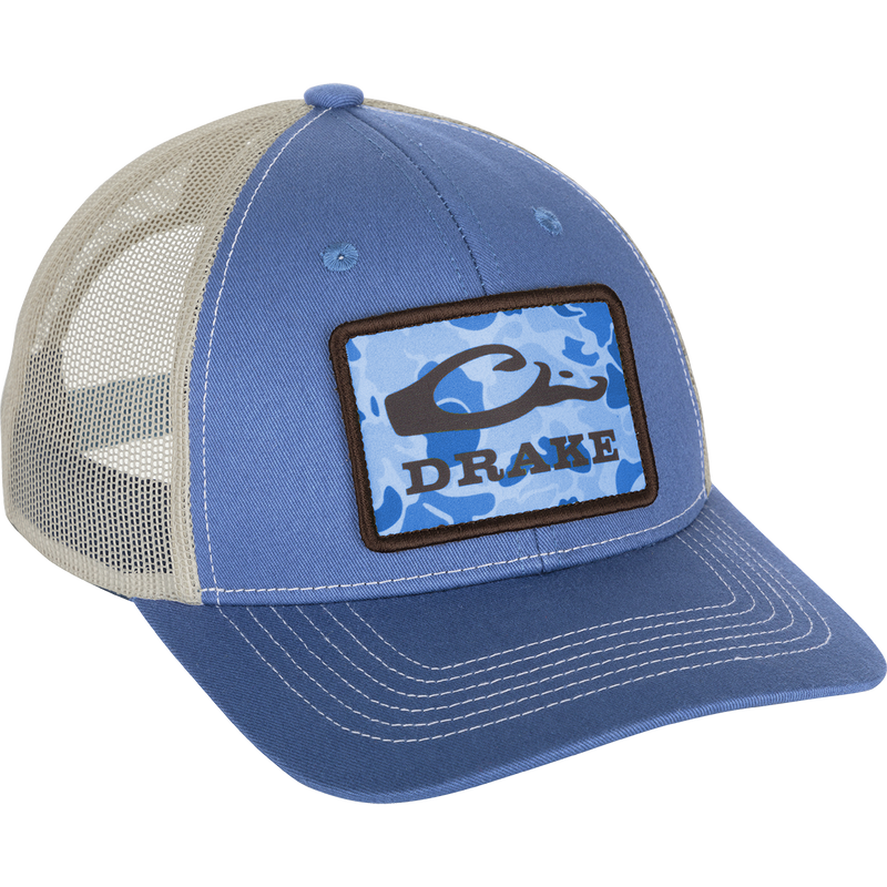 Old School Patch 2.0 Mesh Back Cap: A blue hat with a logo patch and adjustable snap-back closure. 6-panel structured crown construction and pre-curved visor.
