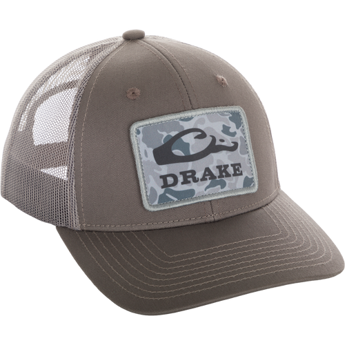 Old School Patch 2.0 Mesh Back Cap: A hat with a patch on it, featuring a camouflage pattern and logo. Perfect for standing out in style.