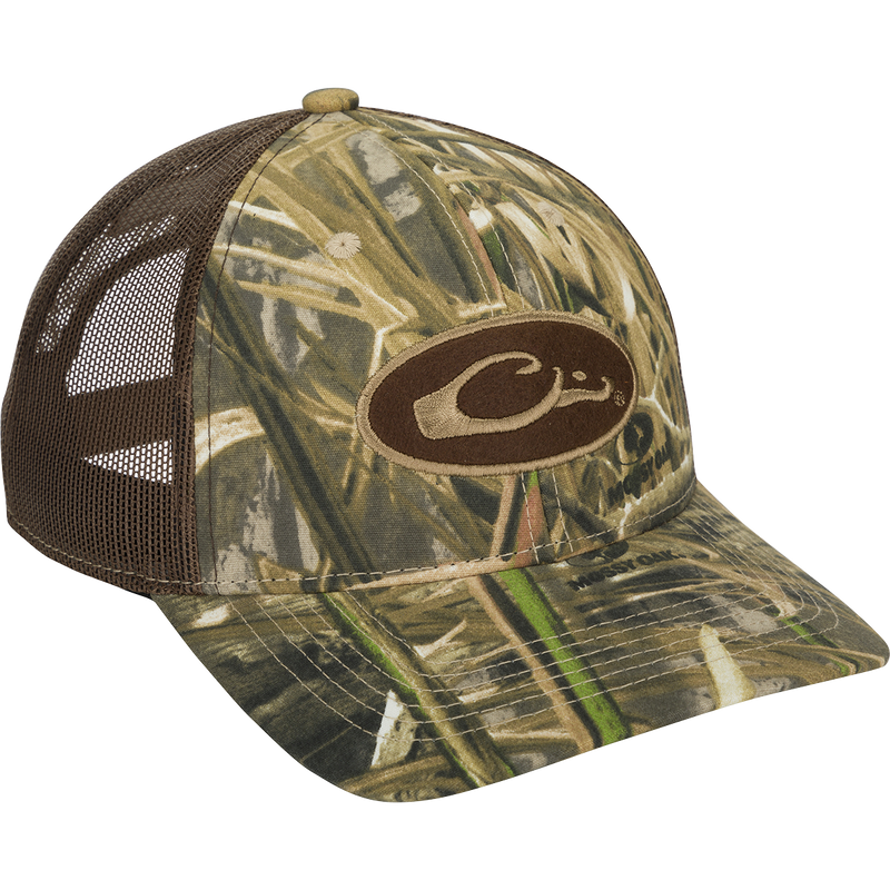 Oval Patch Camo Mesh Back Cap - Realtree: A structured six-panel hat with a camouflage design and logo on the front. Features a mesh back and adjustable snap back closure.