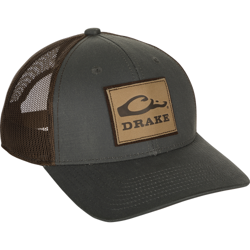 Leather Patch Mesh Back Cap with debossed Drake Logo on a weathered cotton/poly structured trucker hat. Comfortable and ruggedly handsome.