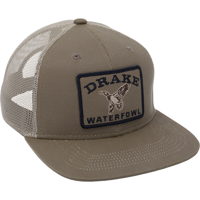 Duck Patch Mesh Back Cap features a structured crown, mesh back, and embroidered DRAKE WATERFOWL patch, ideal for waterfowl enthusiasts seeking durable, breathable headwear.