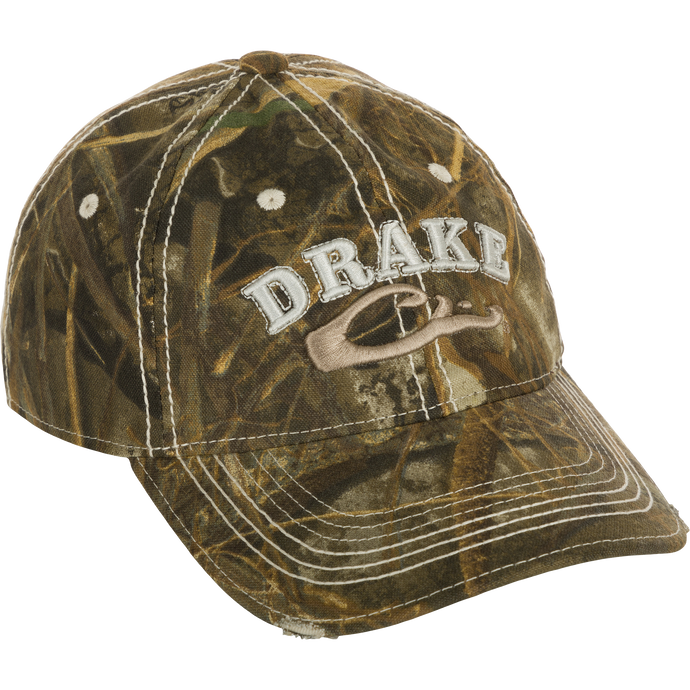 Distressed 6-Panel Ball Cap with Drake Logo embroidery on camouflage fabric, frayed visor, and contrast stitching.