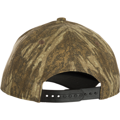 A close-up of the 6-Panel Badge Cap, a must-have for any outdoorsman wardrobe. Constructed of cotton blend panels with a secure rear snap closure. Enjoy a comfortable fit every time you put it on.