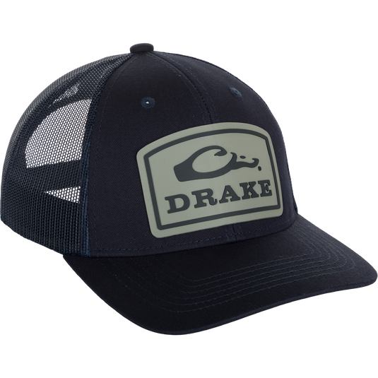 Drake Badge Logo Mesh Cap, a stylish cotton blend and polyester mesh cap with a custom fit snap closure. Perfect for any outfit.