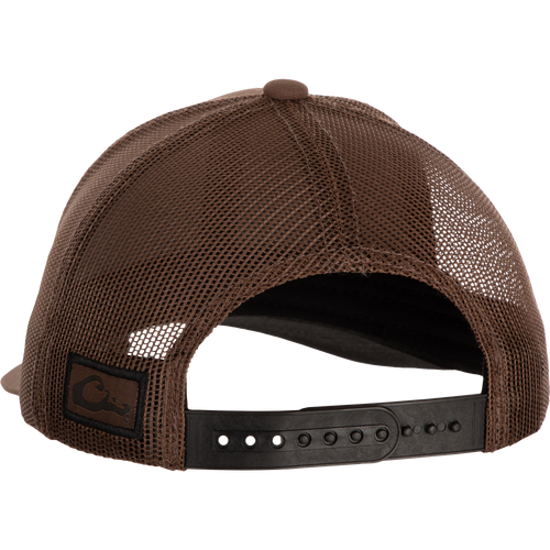 Drake Badge Logo Mesh Cap - A stylish brown hat with a black leather belt and logo detail. Made from durable cotton blend and polyester mesh. Adjustable snap back closure for a custom fit.