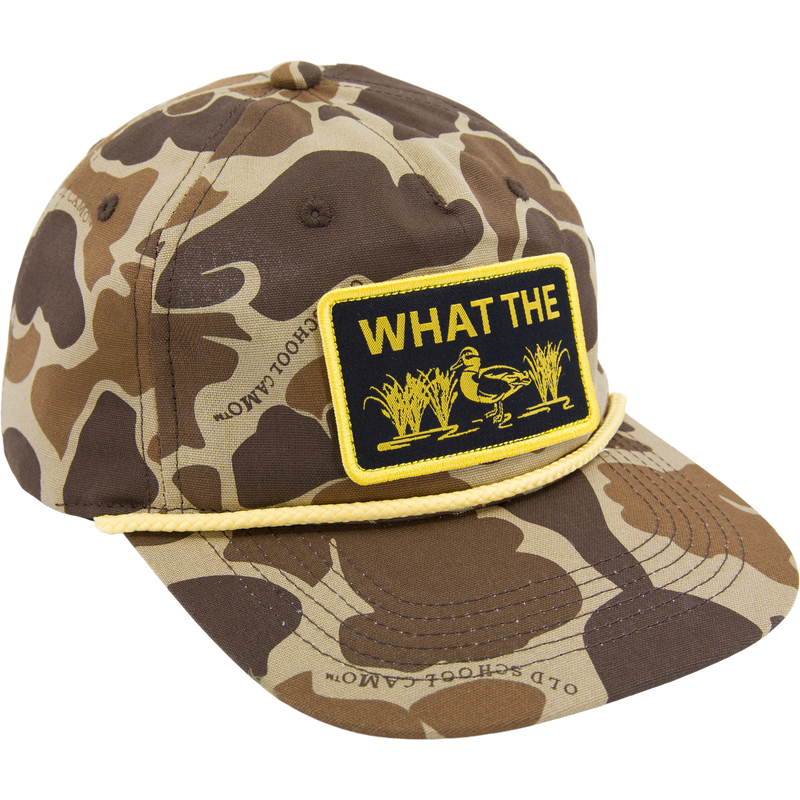 Drake What The Duck Rope Cap featuring a camo pattern, yellow rope detail, and a humorous duck patch. Includes flat visor, adjustable snap-back, and comfort sweatband.