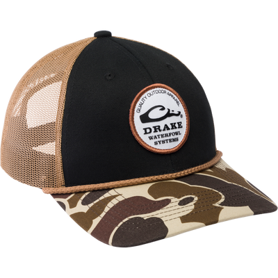 Drake Circle Badge Back Rope Cap with mesh back, camo visor, and snap-back closure, featuring a logo patch and structured crown for comfortable fit.