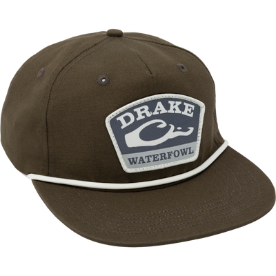 Drake X Lost Hat Drake Patch Goat Rope Cap with snake patch, featuring mesh buckram, flat visor, and snap-back closure for customizable fit.