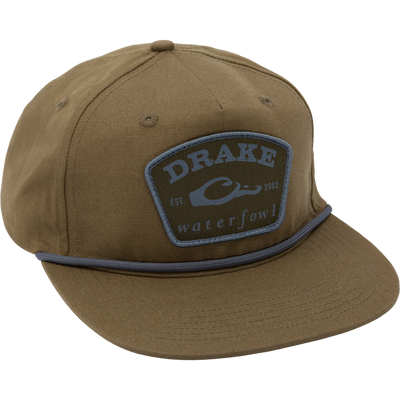 Drake X Lost Hat Drake Patch Goat Rope Cap featuring a logo patch, unstructured design, flat visor, and adjustable snap-back closure for a custom fit.
