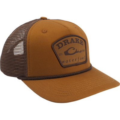 Drake X Lost Hat Rancheero Mesh Back Rope Cap featuring a stitched DRAKE waterfowl EST. 2002 patch, duck graphic, mesh back, and braided rope detail.