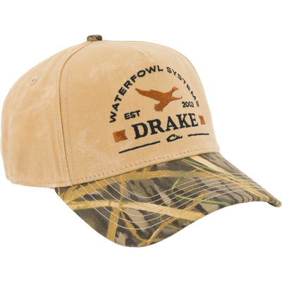 Drake X Lost Hat Coot Goat Rope Cap featuring a flying duck silhouette and Waterfowl Systems EST 2002 embroidery on a camo-patterned bill, with snapback closure.