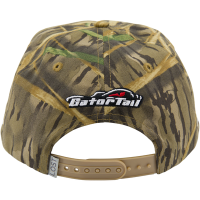 Drake x Lost Hat MBRGA Goat Rope Cap's camo back panel, featuring woven LOST tag, GatorTail patch, and adjustable snapback for a perfect fit.
