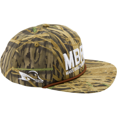 Drake x Lost Hat MBRGA Goat Rope Cap, camo-patterned snapback with Make Boat Ramps Great Again embroidered, featuring fish/boat motif, adjustable fit, enhancing boat ramp restoration efforts.