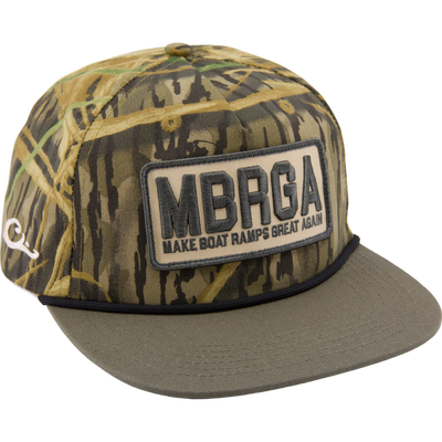 Drake x Lost Hat MBRGA Hybrid Patch Goat Rope Cap, camo-pattern trucker hat with Make Boat Ramps Great Again patch, adjustable snap back, and embroidered details.