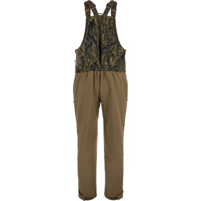 Non-Typical Statix Fleece Lined Bib with Agion Active X2 features camo fleece bib and olive-drab legs, designed for warmth and durability in extreme hunting conditions.