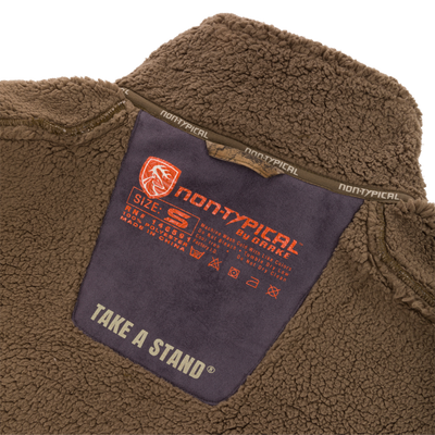 Inside collar label of the Midweight Nova Silencer Vest with Agion Active X2, showing brand, size, care instructions, and functional features for outdoor enthusiasts.