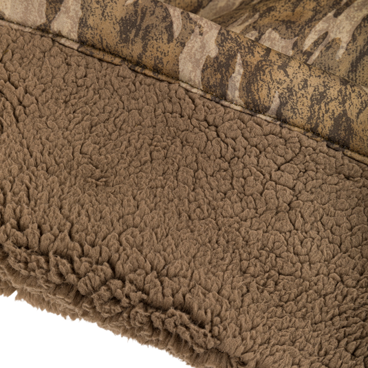 Midweight Nova Silencer Pant with Scent Control featuring brown sherpa fleece lining and camo-patterned shell, showcasing durable, warm, and quiet materials with advanced scent control technology.