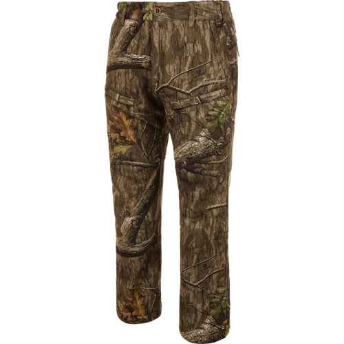 Midweight Nova Silencer Pant with Scent Control in woodland camouflage, featuring durable, water-resistant fabric with anti-odor technology, stretch waistband, and multiple zippered pockets for enhanced hunting mobility.