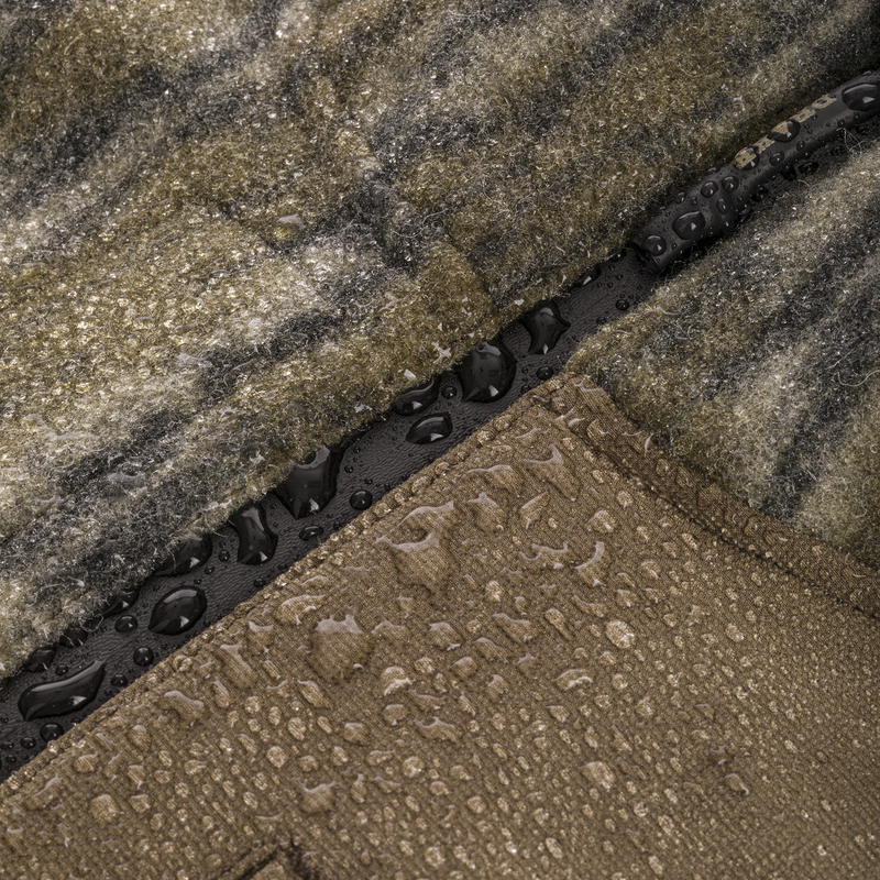 Midweight Hydrowool Softshell Jacket's water-resistant wool blend and reinforced twill fabrics, showcasing beaded rain droplets and waterproof seam, ideal for outdoor hunting adventures.