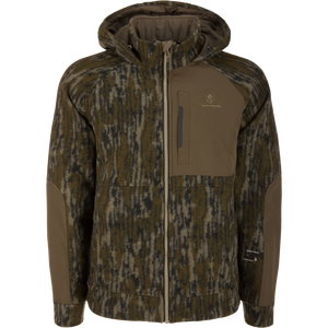 Midweight Hydrowool Softshell Jacket features an olive camo pattern, reinforced panels, and a vertical chest zip pocket, ideal for harsh outdoor conditions and scent control.