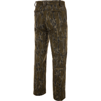 Midweight Hydrowool Softshell Pant with Scent Control features a camouflage design, rear welt pockets, articulated knee seams, and a Non-Typical logo, ideal for outdoor adventures.