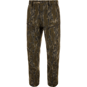 Midweight Hydrowool Softshell Pant with Scent Control, featuring camouflage pattern, zippered pockets, and buttoned waistband, ideal for hunting with windproof, waterproof, and anti-odor properties.