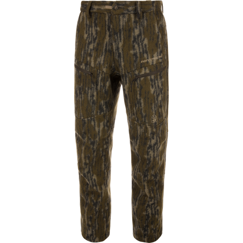 Midweight Hydrowool Softshell Pant with Scent Control, featuring camouflage pattern, zippered pockets, and buttoned waistband, ideal for hunting with windproof, waterproof, and anti-odor properties.