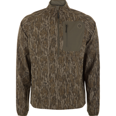 Non-Typical Lightweight SWT Half Zip Pullover with Scent Control in Mossy Oak Bottomland camo, featuring a zippered chest pocket, stand-up collar, and ergonomic thumbholes.