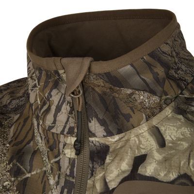 Non-Typical Lightweight SWT Half Zip Pullover with Scent Control featuring a brown-green camo pattern, visible zipper, and drawcord loop at the collar for outdoor adventures.