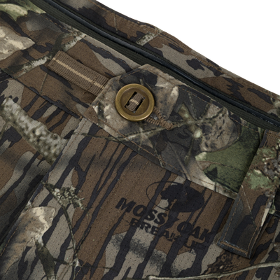 Camouflage-patterned gear with visible zipper, strap, and brass ring, hinting at its use for the Non-Typical SWT Pant with Scent Control, ideal for outdoor adventures.