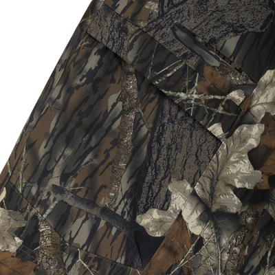 Close-up of Non-Typical SWT Pant with Scent Control showcasing woodland camouflage pattern, highlighting durable, quiet fabric and advanced scent control features.