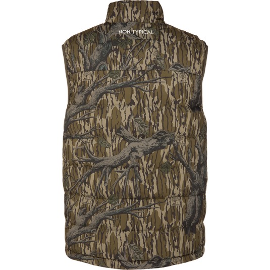The Non-Typical Down Vest with Agion Active X2 by Nontypical features a brown camo design, sleeveless insulation, and NON-TYPICAL text on the back—ideal for chilly outdoor hunts.
