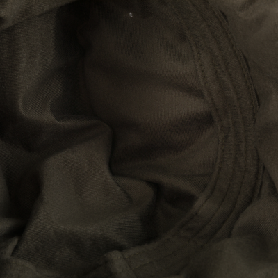 Close-up of the Non-Typical Down Hat with Agion Active X2, showcasing its durable knit fabric and seams, designed for warmth and comfort in harsh hunting conditions.