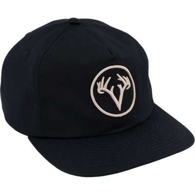 Non-Typical x LOST Stepdad Logo Cap featuring a tan deer-antler emblem on the front, offering a structured mid-profile fit and adjustable snapback for comfort.