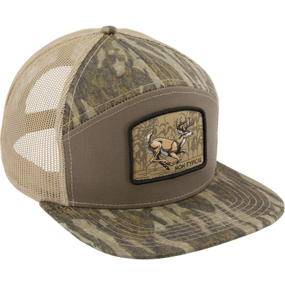 Camouflage trucker cap featuring a pronghorn patch with NON-TYPICAL. The Non-Typical x Lost Hat Sa7age Buck Run Cap offers comfort and durability with a snapback closure.
