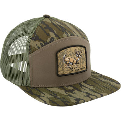 Camouflage-patterned trucker cap with an antelope patch, mid-profile design, snapback closure; ideal for hunting and outdoor activities.