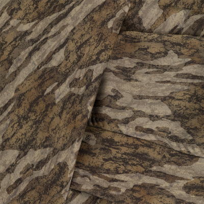 Close-up of the Non-Typical Performance Hoodie with Scent Control, showcasing its camouflage-patterned fabric, stitching, and folds, highlighting its durability for hunting and outdoor activities.