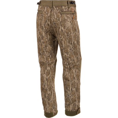 Alt text: Silencer Soft Shell Pant with Agion Active XL featuring camouflage pattern and multiple pockets for hunting.
