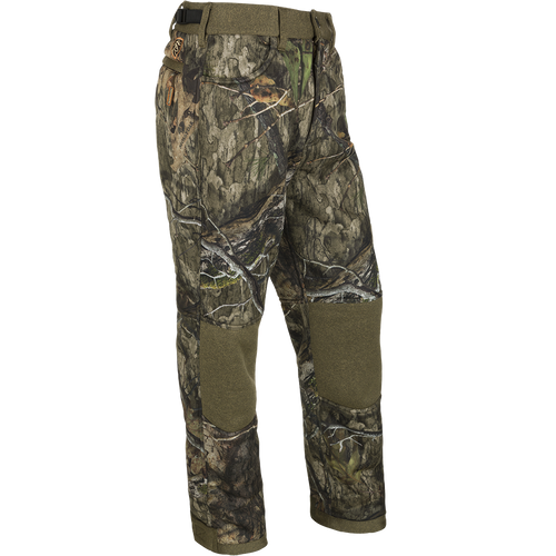 Mossy Oak Country DNA Camo: Silencer Soft Shell Pant with Agion Active XL, a pair of camouflage cargo pants for hunting.