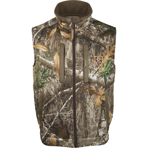 Silencer Vest with Agion Active XL, a camouflage patterned vest with leaves and a logo of a deer. Features vertical zippered chest pocket and lower zipped pockets.