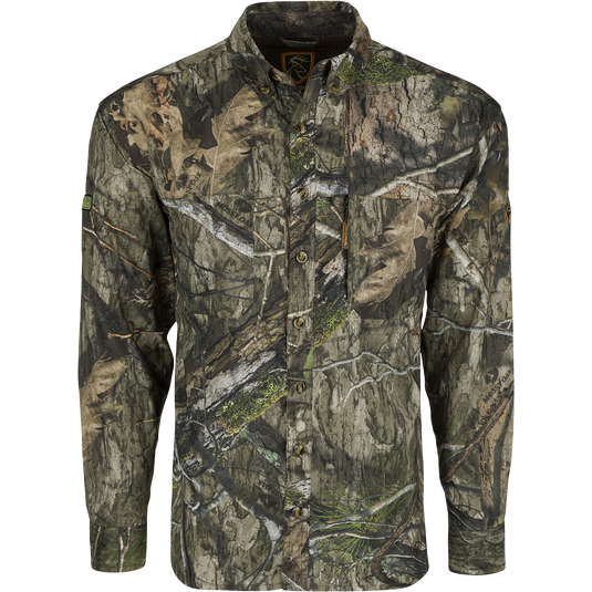A long sleeved shirt with camouflage pattern, featuring mesh back and side panels for breathability. Ideal for warm weather hunts.