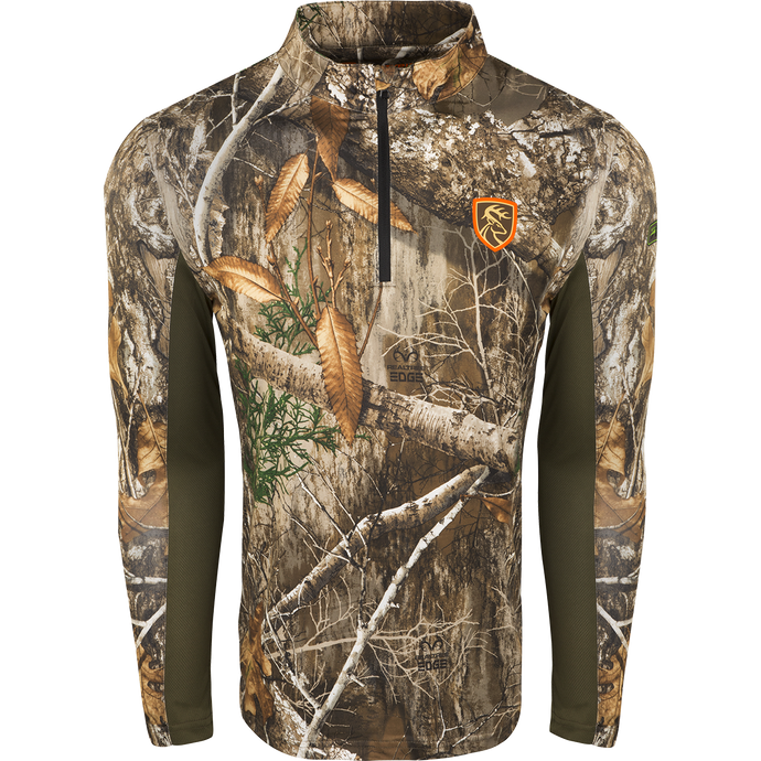 A camouflage jacket with a logo of a deer, perfect for early season hot weather walks to and from the stand. The Performance 1/4 Zip L/S with Agion Active XL® is moisture-wicking, ultralight, and fade-resistant. Ideal for total concealment and staying cool.